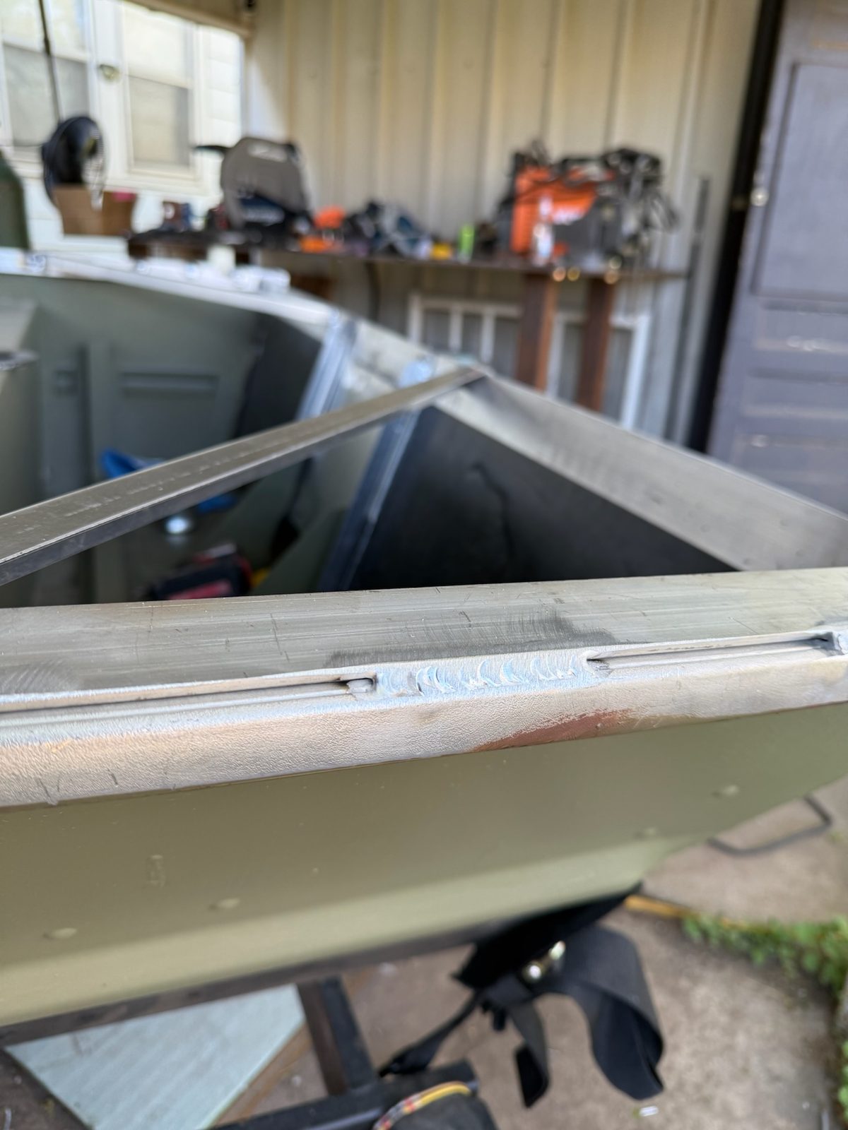 Aluminum boat repair and transom modification for outboard installation — photo 1